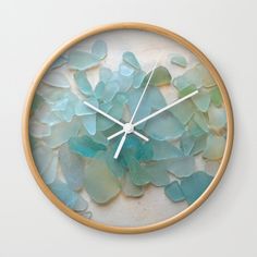 a clock with sea glass on the face