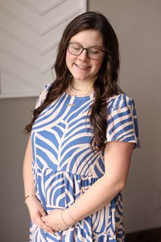 This Blue Boho Tiered Maxi Dress is perfect for a happy and simple summer look. The light weight material will keep you comfortable while the flowy tiered design adds a touch of feminine chic. Plus, it has pockets for added convenience! The Fit of This Boutique Maxi Dress: See HOW TO MEASURE Here. TOP: Flat Across Measurements in Inches Size: Chest Across Waist Across Length Small 17 25 45 Medium 18 26 45 Large 19 27 46 X-Large 21 29 47 2XL Casual Short Sleeve Tiered Beach Dress, Chic Blue Tiered Dress For Day Out, Casual Blue Tiered Beach Dress, Casual Blue Tiered Dress, Blue Casual Flowy Tiered Dress, Casual Blue Flowy Tiered Dress, Casual Blue Tiered Summer Dress, Casual Blue Tiered Dress With Loose Fit, Modest Tiered Summer Dress