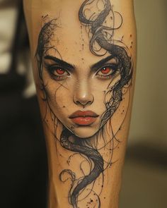 a woman's face with red eyes and an intricate snake tattoo on her leg