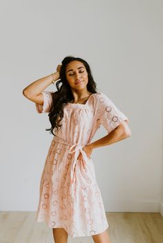 Our Blush Eyelet Dress is a beautiful Spring and Summer dress! Made with a tie waist, knee length, and flared sleeves. Available in women's sizes: Small: Bust: 32" Waist: 28" Length: 39" Medium: Bust: 35" Waist: 36" Length: 40" Large: Bust: 37" Waist: 41" Legnth: 40" White Dress Bridesmaid, Dresses Outfit Ideas, Summer Dress Midi, Lehi Utah, Outfit Ideas Cute, Lace Dress White, Neutral Dress, Photo Dress, Blush Dress