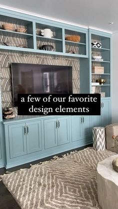 a living room filled with furniture and a flat screen tv on top of a blue entertainment center