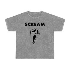 This hand-dyed gray Ghostface tee is a must-have for any Scream fan this Halloween. Featuring a one-of-a-kind dye pattern, each shirt is unique, adding a personal touch to the chilling Ghostface design. Made from soft, breathable cotton, this tee provides all-day comfort while giving off a bold, horror-inspired vibe. With a relaxed fit and durable stitching, it's perfect for casual wear or Halloween festivities. Whether you're a fan of the Scream franchise or just love spooky style, this Ghostfa Scream Franchise, Halloween Graphic Tees, Scream, Just Love, Trendy Outfits, Top Shirt, Halloween Costumes, Graphic Tees, Gender Neutral