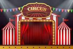 an image of a circus stage with red curtains