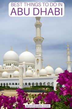 a white building with purple flowers in front and the words best things to do in abu,