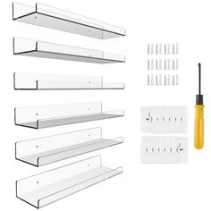 several shelves and tools are shown in this image, including screwdrives, glue sticks, and plastic dividers