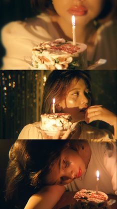 two women sitting in front of a cake with candles on it