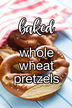 some pretzels are sitting on a table with the words soft whole wheat pretzels