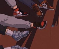 four people standing in a circle with their feet on each other's ankles and wearing sneakers