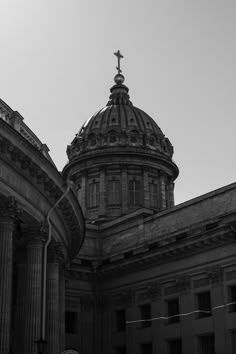 an old building with a cross on top