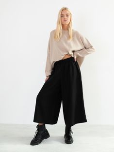 "JAYDEN is a high waist linen culottes. Style with BEE linen top https://www.etsy.com/listing/657832239/bee-linen-top-simple-linen-blouse-loose DETAILS - Cropped length - Side seam pockets - Wide leg - Elasticated waist - 100% lightweight European linen fabric - Cut and sewn to order just for you in our studio COLOR - Black, you can also choose other colors above - Fabric samples are available here https://www.etsy.com/listing/586569696/linen-fabric-samples SIZING & FIT - Relaxed fit - Lengt Linen Culottes, Black Linen Trousers, Linen Tunic Tops, Wide Leg Palazzo Pants, Handmade Clothing, Linen Tunic, Loose Fitting Tops, Linen Blouse, Loose Blouse