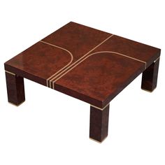 a coffee table with a basketball design on it's top and gold trim around the edges