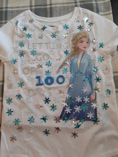 a frozen princess t - shirt with snowflakes on it