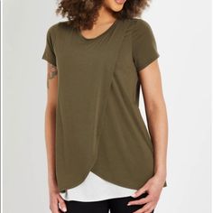 Get The Layered Look With None Of The Hassle In This Open Front Short-Sleeve Nursing Tee. The Tulip Hem Front Layers Over A Mock Tank For Easy Feeding And Doubles As Coverage When You're On The Go. A Must-Have Nursing Top For Every Mama. Nursing Tee Short Sleeve Scoop Neck Pull Over Nursing Function Open Front 61% Polyester / 33% Rayon / 6% Spandex Machine Wash Or Dry Clean Green Shirttail Hem Top For Everyday, Short Sleeve Stretch Blouse For Layering, Stretch Short Sleeve Blouse For Layering, Stretch Tops For Layering With Shirttail Hem, Versatile Green Short Sleeve Top, Stretch Tops With Shirttail Hem For Layering, Front Layers, Nursing Shirt, Nursing Top