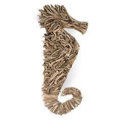 a sea horse made out of driftwood on a white background with clippings