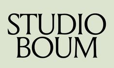 the words studio boum are in black and white letters on a light green background