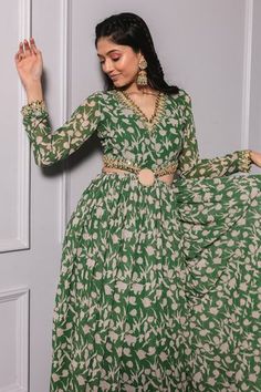 Green anarkali dress with floral prints and embroidery detailing on neckline and waist.
Components: 1
Pattern: Printed
Type Of Work: Floral
Neckline: V neck
Sleeve Type: Full
Fabric: Poly georgette
Color: Green
Other Details: 
Cut-out detailing
Embroidery detailing
Attached lining
Occasion: Destination Wedding - Aza Fashions Bandhni Kurti Designs Latest, Latest Gown Designs, Green Anarkali Dress, Printed Anarkali, Anarkali Dress Pattern, Traditional Indian Dress, Indian Dresses Traditional, Georgette Dress, Indian Gowns