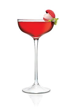 a glass filled with a red liquid and topped with a raspberry garnish