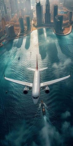 an airplane is flying over the water in front of some cityscapes and skyscrapers