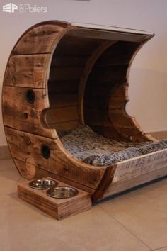 a dog bed made out of wood and metal