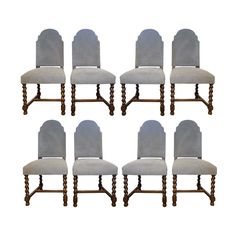 six chairs with grey upholstered back and arms