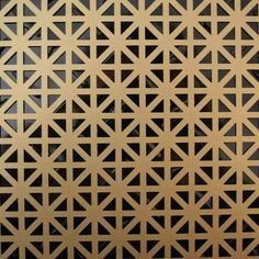 an image of a metallic surface with geometric designs