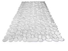 a large white mat with lots of circles on the top and bottom, in varying sizes