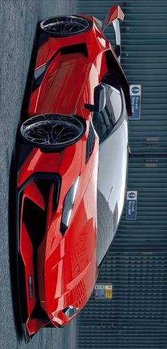 an aerial view of a red sports car