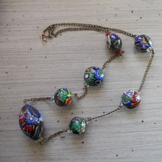 Hey, I found this really awesome Etsy listing at https://www.etsy.com/listing/210030724/vintage-murano-millefiori-beaded Vintage Blue Oval Bead Necklace, Vintage Blue Necklace With Oval Beads, Vintage Blue Necklaces With Oval Beads, Vintage Colorful Beads Necklace For Gift, Vintage Necklaces With Colorful Beads For Gift, Vintage Glass Necklace With Oval Beads, Vintage Glass Necklaces With Oval Beads, Vintage Necklace With Colorful Oval Beads, Retro Glass Necklace For Gifts