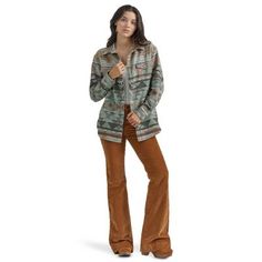 No cowboy's going to be able to pull this off quite as well as you. The women's Wrangler Retro long-sleeve boyfriend fit snap shirt takes a fresh approach to the classic western style you know and love. It features an easy, slightly oversized fit and southwestern print to deliver the perfect amount of femininity. This western snap shirt also comes with pointed yokes from front to back, two chest flap pockets with snaps, a spread collar, and a full snap closure. Boyfriend Fit Long Sleeves Pearl Snap Buttons Western Front & Back Yokes Chest Pockets Classic "W" Stitching 100% Cotton Western Style Tops For Rodeo In Fall, Western Tops For Rodeo In Fall, Country Style Shirt For Fall Rodeo, Country Style Button-up Shirt For Fall, Casual Fall Tops For Ranch, Long Sleeve Top For Ranch In Fall, Western Long Sleeve Tops For Fall, Western Style Relaxed Fit Button-up Tops, Western Style Relaxed Fit Long Sleeve Tops