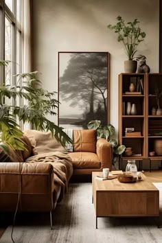 a living room filled with lots of furniture and plants in front of a large window