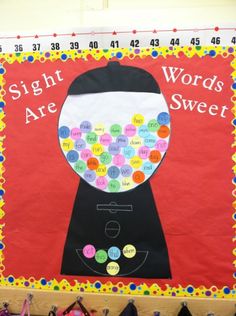 a bulletin board that says sight words are sweet and there is a gumball machine on it