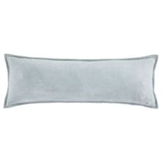 a light blue pillow on a white background