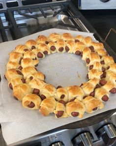 a hot dog bun on top of a stove