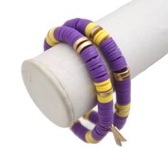 Canvas Set Of 2 Emberly Stretch Bracelets. Purple, Yellow, Gold Polymer Clay Discs. New With Tags, Original Retail Was $24 Each. Bracelets Purple, Gold Polymer Clay, Clay Bracelet, Clay Bead, Purple And Yellow, Canvas Set, Clay Beads, Bead Bracelet, Stretch Bracelets