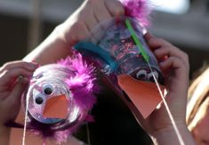 Bird Puppets for Races | DIY for Beginners | KiwiCo Racing Games For Kids, Bird Puppet, Diy For Beginners, Bird Cup, Large Feathers, Diy Projects For Beginners, Drink Straw, Disposable Cups, Racing Games