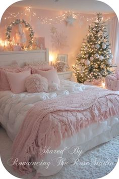 a bedroom decorated in pink and white for christmas