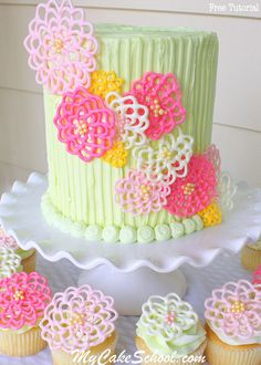 the cake is decorated with flowers and icing