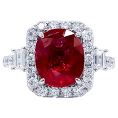 18kt White Gold Diamond Halo Ruby Ring: 4.00ct GIA certified oval cut ruby 1.75cts of baguette and round diamonds on the side Size 6 Affordable Diamond Rings, Radiant Cut Diamond Ring, Ruby Diamond Ring, Diamond Rings With Price, Cool Wedding Rings, Ruby Diamond Rings, Unique Diamond Rings, Bridal Ring Sets, Ring With Diamond