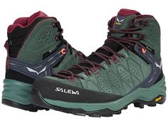 SALEWA Alp Trainer 2 Mid - Women's Shoes : Duck Green/Rhododendon : Take the weekend to new heights with the SALEWA Alp Trainer 2 Mid. Outside elements don't stand a chance as this shoe has supportive and breathable materials for traction while climbing, hiking or any adventure and is essential footwear to have for multiple environments. Suede and PU coated leather upper offers exceptional durability. Vibram hike approach sole effortlessly grips rock and dirt. Versatile hiking boot that doubles Waterproof Low-top Trail Running Shoes For Climbing, Functional Walking Shoes With Removable Insole For Outdoor Activities, Sporty Round Toe Hiking Boots For Climbing, Sporty Hiking Boots For Climbing With Round Toe, Sporty Hiking Boots With Round Toe For Outdoor, Waterproof Casual Hiking Boots For Climbing, Functional Waterproof Sneakers For Climbing, Casual Waterproof Hiking Boots For Climbing, Waterproof High-top Hiking Boots For Climbing