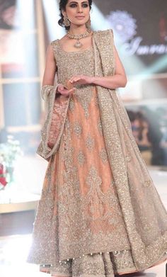 Asian Bridal Lahnga In Beutifull Peach Color. With Pure Dull Gold Silver Dabka Nagh Pearls,Zari,And Moti.Bridal Mehndi Lahnga Bridal Walima Lahnga And Maxi Available. Ali Xeeshan, Bridal Couture Week, Walima Dress, Desi Wedding Dresses, Bridal Outfit, Indian Bridal Wear, Wedding Hijab, Glam Look, Pakistani Bridal Dresses