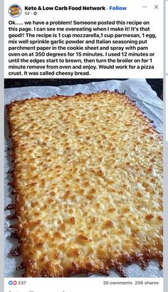 a large square piece of food sitting on top of a white sheet of wax paper