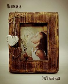 Picture frame made from solid wood,  distressed white wood or brown colour, decorated with two hanging wood hearts, a distressed white one and a brown one.Frame back in mdf, metal support. Frame with glass.Available for two Picture size options:For 5x7" pictures (cm 13x18).For 6x8" pictures (cm 15x20).Available in two colour options:Distressed white woodBrown colourThe frame can be used both for horizontal and for vertical pictures.This item is handmade. Heart Picture Frames, Heart Picture Frame Craft, Vertical Pictures, Picture Frames. Wood, Distressed White Wood, Rustic Brown Picture Frames, Picture Frames Barn Wood, Wooden Picture Frame