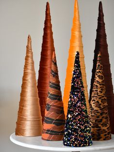 there are many different colored cones on the table