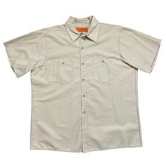 This Item Is A Vintage Universal Overall Short Sleeve Workshirt. Made In Chicago, Il. Khaki Tan. Durable Press. In Unworn Condition. Tag Size. L With Measurements In The Pictures. Khaki Cotton Collared Shirt, Fitted Beige Shirt With Pockets, Fitted Collared T-shirt With Pockets, Relaxed Fit Cotton Camp Shirt In Khaki, Khaki Cotton Shirt With Camp Collar, Khaki Cotton Relaxed Fit Camp Shirt, Solid Color Collared T-shirt With Pockets, Solid Collared T-shirt With Pockets, Khaki Cotton Short Sleeve Shirt