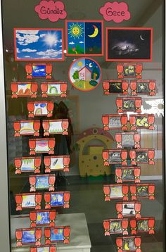 a display case with many pictures on the front and side of it, all in different colors