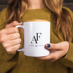 a woman holding a coffee mug with the words don't look back on it