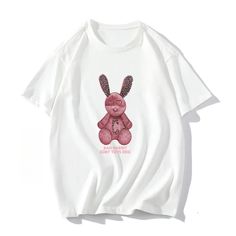 Hop into style with our Lorie Cute Rabbit Printed T Shirts! Perfect for any bunny lover, these tees showcase adorable fashion rabbit in a bad boy edge. Made with soft and comfortable fabric, these shirts are a must-have for any playful wardrobe. Hop to it and grab yours today! Gender: WOMEN / UNISEX Item Type: Tops & Tees, T-Shirts Material: COTTON Elasticity: Slight Stretch Pattern Type: CARTOON Rabbit Collar: O-Neck Fit Type: LOOSE SIZE CHART Size (CM) Bust Shoulder Sleeve Length M 100 48 19 6