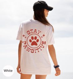 Retro inspired aesthetic positivity tshirt. Perfect for casual tumblr, oversized look. Makes a good gift for Dog or cat lover. Dog Paw gifts for dog/animal lovers. Please note that this tshirt is NOT oversized. It is a unisex fit that runs True to Size. If you want more oversized fit, we recommend sizing up 2 or 3 sizes. PRODUCT DETAILS: *      100% soft cotton (polyester content varies with color) breathable fabric *Pre-shrunk fabric with the right amount of stretch *Side-seamed construction *S Dog Tshirt Design Ideas, Dog Mom Shirt Ideas, Dog Tshirt Design, Fun Tshirt Designs, Dog Tshirt Ideas, Dog Shirt Ideas, Trendy Tshirts Graphic Tees Design, Az Logo, Graphic Design Tshirt