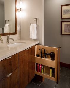 the bathroom is clean and ready to be used as a storage area for personal items