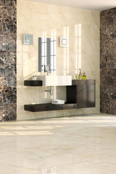 a bathroom with marble walls and flooring next to a bathtub in the middle